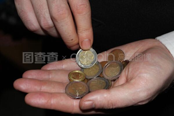拿硬幣的人,金融概念